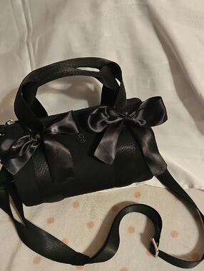 Lululemon Black Mini Barrel Bag Satin Bows